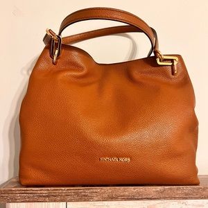 Michael Kors pebble leather shoulder bag.